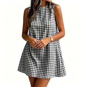 Close-up detail of women's chic black and white gingham sleeveless casual mini dress