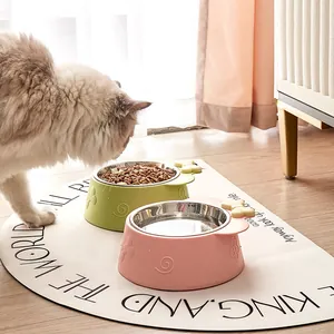 Cute bow-knot stainless steel pet feeding bowls for cats and dogs in a home setting