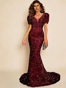 Elegant burgundy sequined evening gown with deep V-neck and mermaid silhouette for formal events