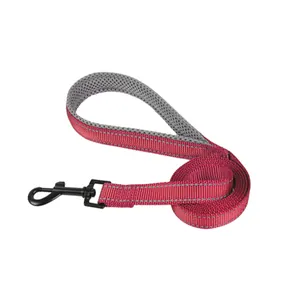 Close-up of red reflective dog leash featuring a soft padded handle and sturdy metal clip.