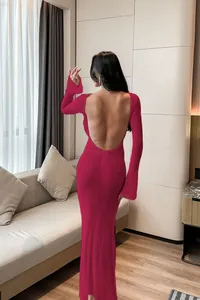 Detailed backless view of a magenta long-sleeved knit beach cover-up dress for women