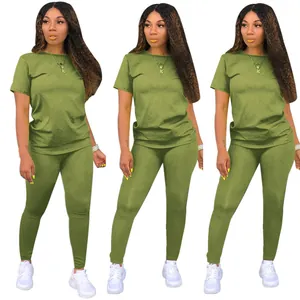 Detailed look at the olive green solid color round neck short sleeve top and leggings set