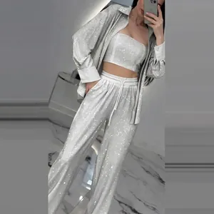 Glamorous white sequin three-piece set with long shirt, tube top and wide pants
