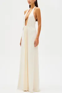 Sleeveless cream maxi dress design showcasing the plunging deep V-neckline and drape
