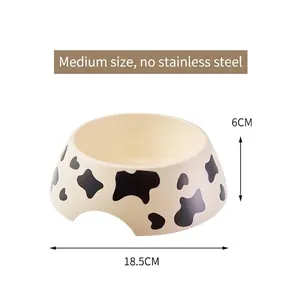 Detailed view of the cow print pattern pet bowl showing 18.5cm diameter and 6cm height