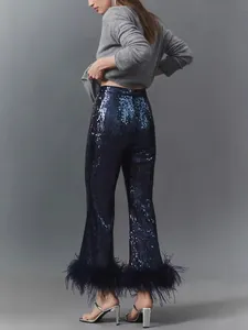 Elegant navy blue sequin flare pants featuring ostrich feather trim for festive parties