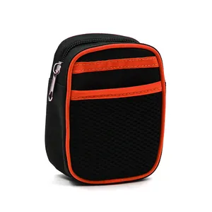 Detail shot of the black and orange accessory pouch for the running pet leash set.