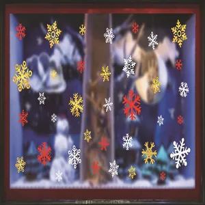 Vista detallada de pegatinas estáticas de copos de nieve de colores para decoración navideña.