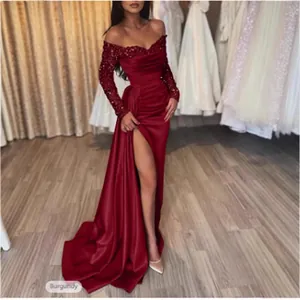 Elegant burgundy off-shoulder evening gown with sequins and high slit for prom