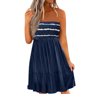 Detailed macro view of a navy blue smocked tube top summer dress with white stripes
