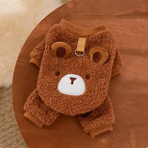 Detailed view of brown teddy bear plush pet outfit with leash D-ring attachment