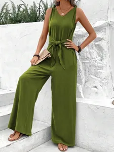 Detail view of olive green V-neck wide-leg sleeveless jumpsuit with tie-front knot