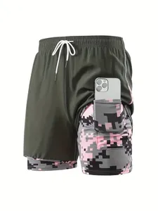 Detail of women's 2-in-1 running shorts showing built-in pocket on digital camo lining