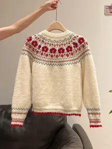 Vintage Fair Isle patterned knit sweater in cream with red and blue accents, retro style