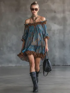 Model walking in a stylish blue leopard print off-shoulder long sleeve mini dress