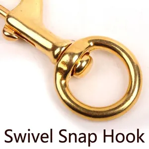 Macro shot of a high-quality gold-plated brass swivel snap hook for pet leash accessories