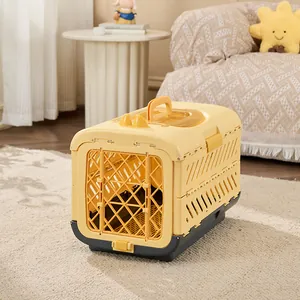 Detailed view of yellow foldable pet carrier with ventilation slots on home rug