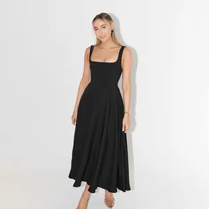 Close-up detail of an elegant black square neck sleeveless waist-cinching midi dress