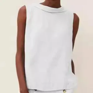 Elegant white cotton linen sleeveless top with a minimalist round neck for casual summer wear