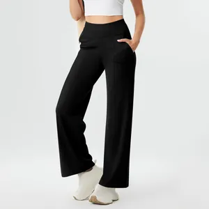 Women's high-waisted black yoga pants with side pockets in straight-leg design