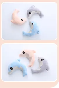 Set of three colorful cartoon dolphin catnip plush toys for cats in pink, blue, and gray.