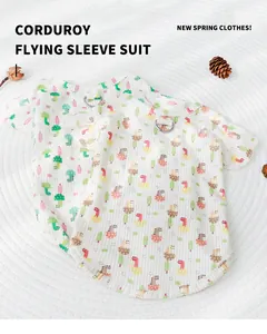 Detail of breathable corduroy pet vest with colorful dinosaur prints and leash D-ring.