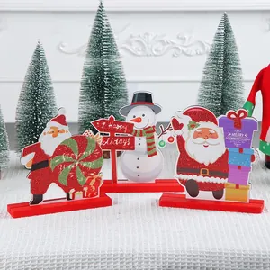 Wooden Christmas tabletop decoration set featuring Santa Claus and snowman ornaments