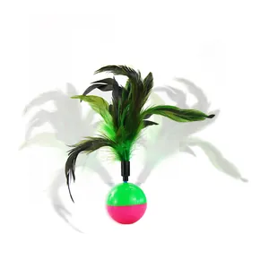 Interactive cat tumbler toy featuring green and black feathers for pet entertainment