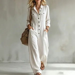 Chic white linen jumpsuit for women featuring long sleeves and a relaxed wide-leg fit.