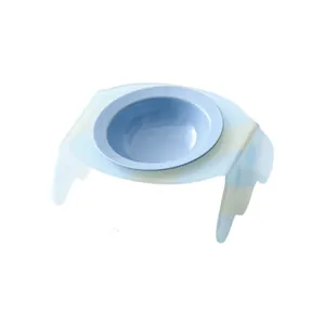 Elevated ceramic pet bowl with tilted light blue acrylic stand for cats and dogs