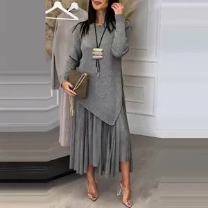 Casual grey two-piece knitted set with asymmetrical top and pleated skirt for women