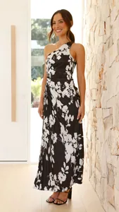 Elegant one-shoulder maxi dress with black and white floral print and pleated waist