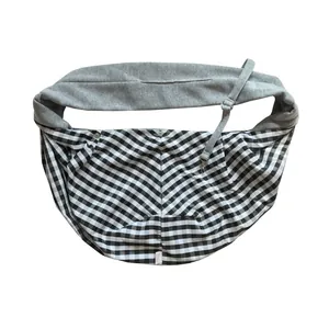 Foldable black and white checkered pet sling carrier for small dogs and cats outdoors