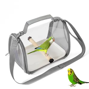 Portable gray bird carrier bag with transparent window and wooden perch