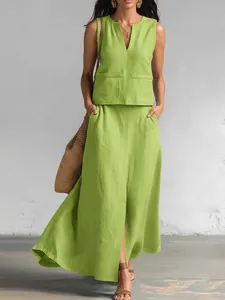 Detail view of lime green cotton-linen sleeveless V-neck top and skirt set with pockets