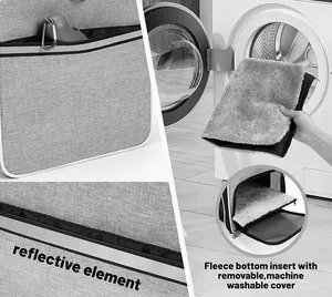 Detail of pet carrier showing reflective strip and machine washable fleece mat