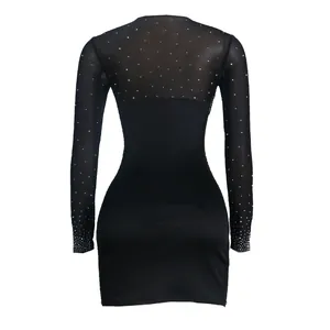 Detailed back view of a black bodycon mini dress featuring rhinestone mesh sleeves