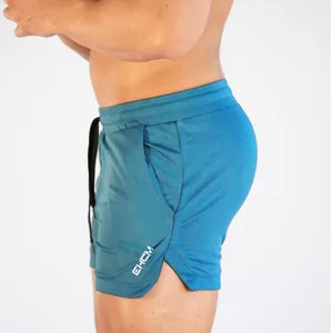 Men's blue quick-dry athletic shorts with side slit for running and fitness training