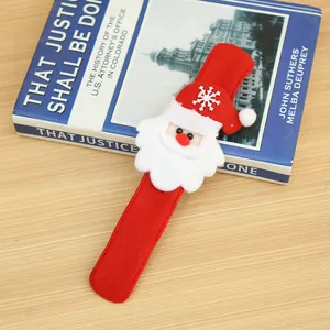 Detailed view of festive Christmas Santa Claus slap bracelet made of soft red felt fabric