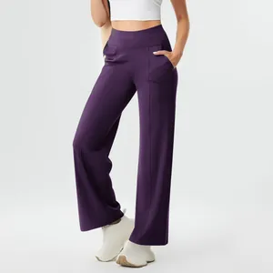 Women's high waisted purple yoga pants with pockets, slim straight leg sports trousers.