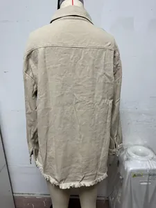Detailed back view of khaki washed denim shirt jacket with frayed raw hem for women.