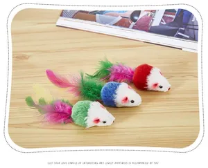 Detail view of three colorful plush mouse cat toys with vibrant feather tails.
