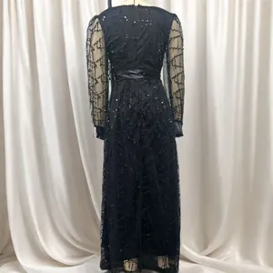 Elegant back view of black sequined mesh evening gown with floor-length silhouette