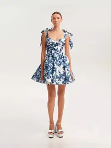 Elegant floral organza mini dress with bow shoulder straps and flared skirt