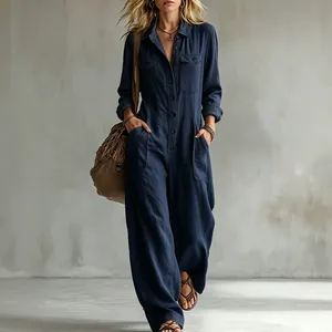 Loose navy blue linen jumpsuit with lapel collar and wide legs for women's vacation.