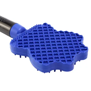 Detailed close-up of 3-in-1 blue silicone pet bath brush for dog grooming and deshedding