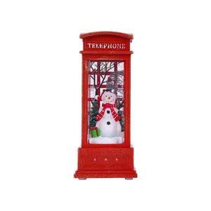 Festive red London telephone booth lamp with a cute snowman for Christmas decoration