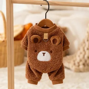 Close-up of brown plush bear-style pet onesie with integrated harness ring