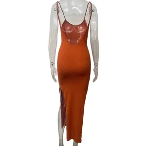 Back view of sexy orange knitted backless maxi dress with high side slit detail