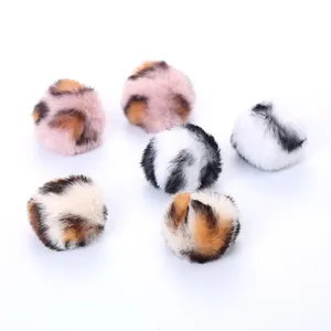 Six soft leopard print faux fur interactive pom-poms for playful cat exercise and fun
